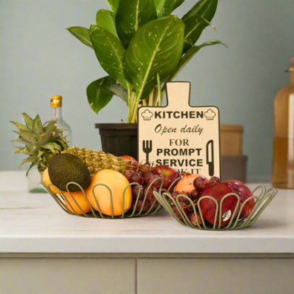 Naomi Green food-safe fruit basket made of iron, featuring a textured powder-coated finish, perfect for storing and displaying fresh fruits in a stylish and durable way