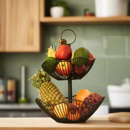 Elegant 2 Tier Fruit Basket with a gold electroplated finish, featuring a stylish and modern design with a sturdy base, perfect for displaying fresh fruits in a sophisticated home setting.