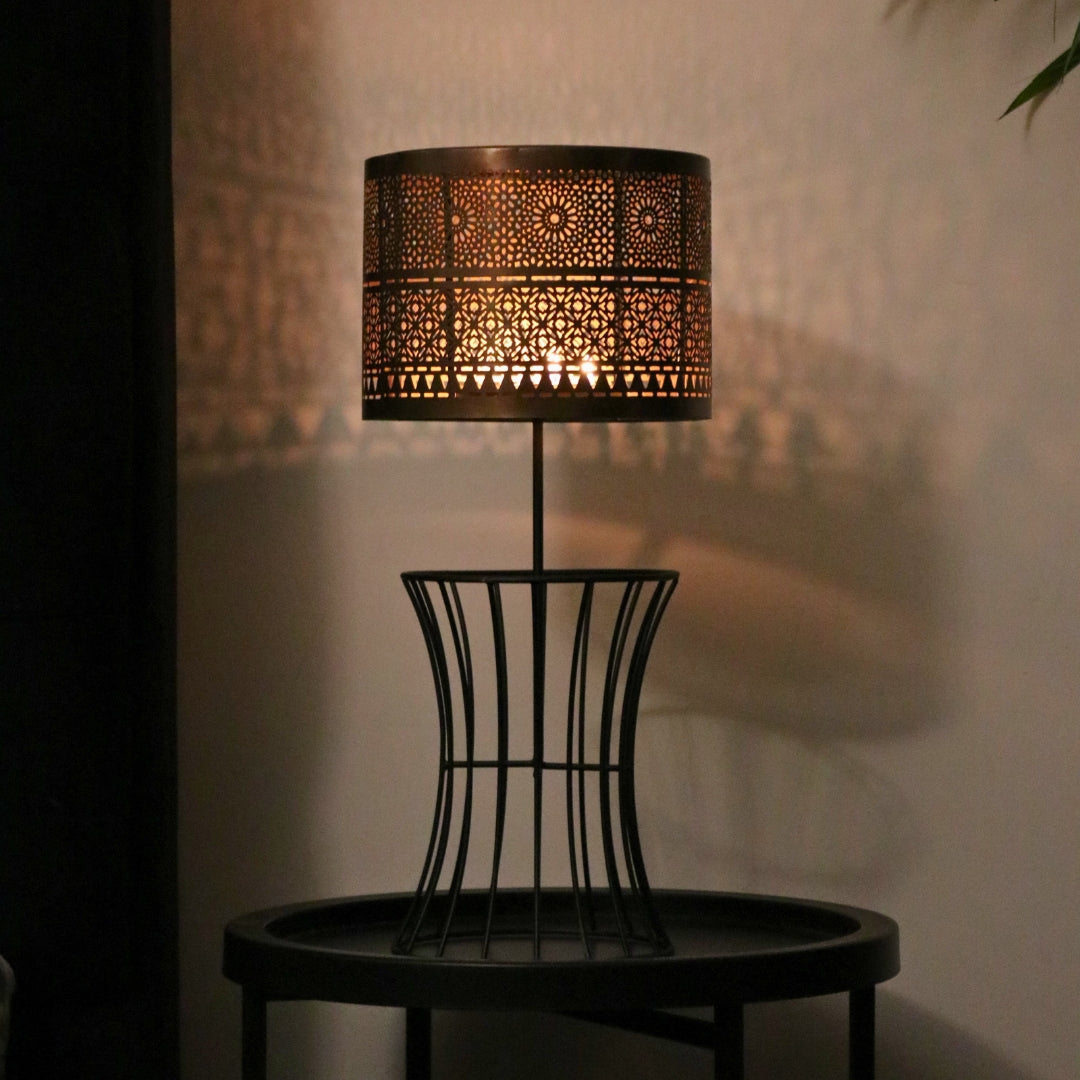 Christen Candle Table Lamp made of iron with a plated copper and gold finish, designed to hold 4 candles.